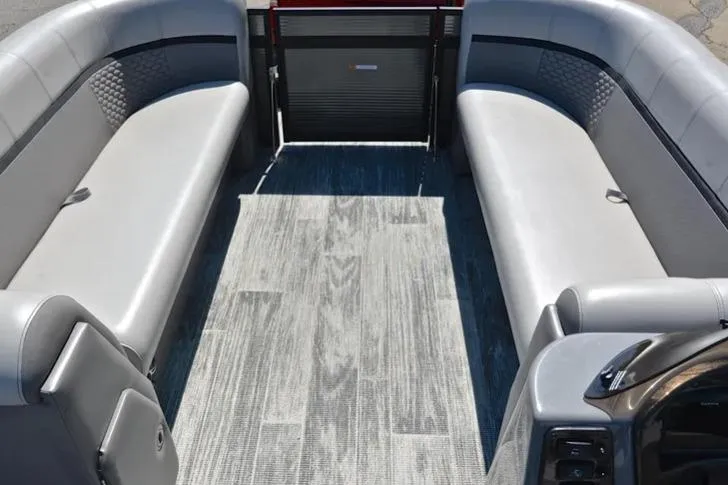 Slide: The Image of Interior of 2023 Qwest RLS 822 pontoon boat with gray seating and flooring. - 4