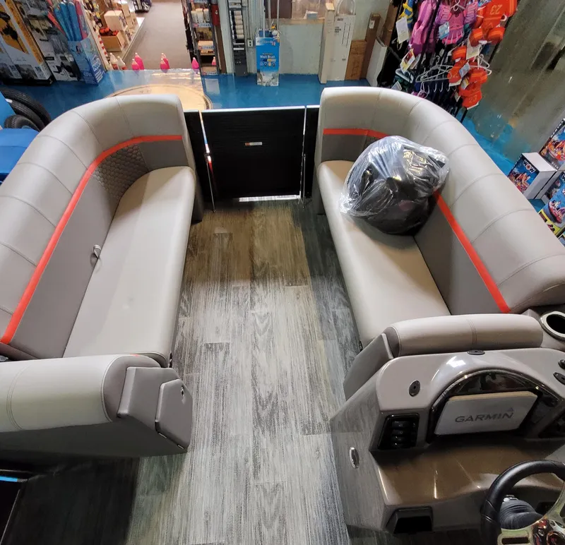 Slide: The Image of Interior of 2023 Qwest RLS 822 boat with gray seating and modern dashboard. - 16