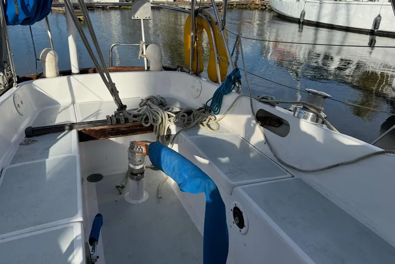 Slide: The Image of Cockpit of a 1975 Cascade 36 sailboat with ropes and winches. - 24