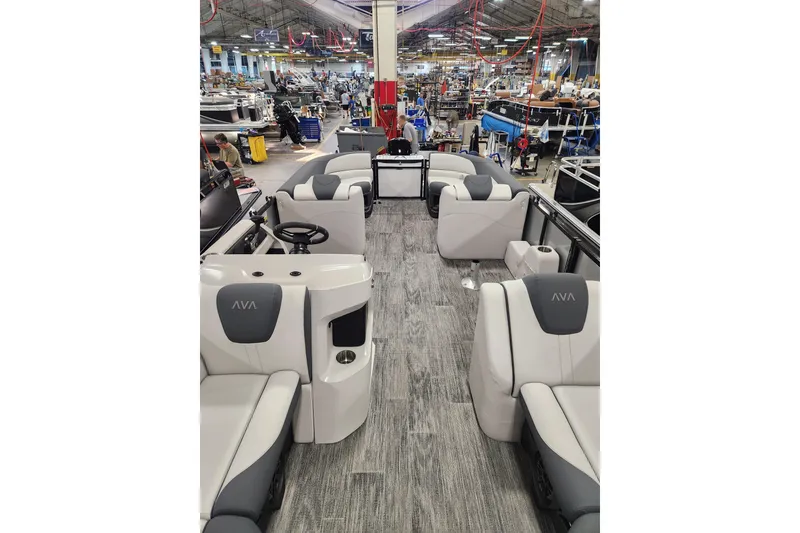 Slide: The Image of 2025 Avalon LSZ Quad Lounger interior in a manufacturing facility. - 7