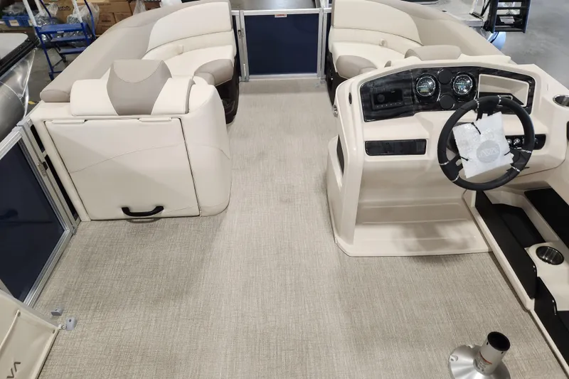 Slide: The Image of 2026 Avalon LSZ Quad Lounger interior with beige seating and modern dashboard. - 6