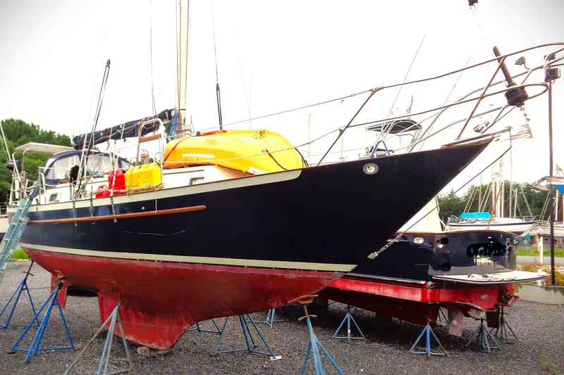 The Image of Pacific Seacraft 37 sailboat, 2000 model, on stands in a boatyard. - 0
