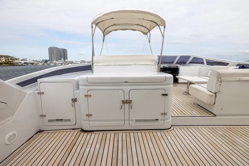 Slide: The Image of Luxurious deck of 1999 Azimut 100 Jumbo yacht with seating and canopy. - 20