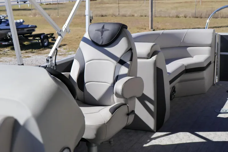 Slide: The Image of 2024 Berkshire 24RFX LE boat interior with luxurious seating and modern design. - 14