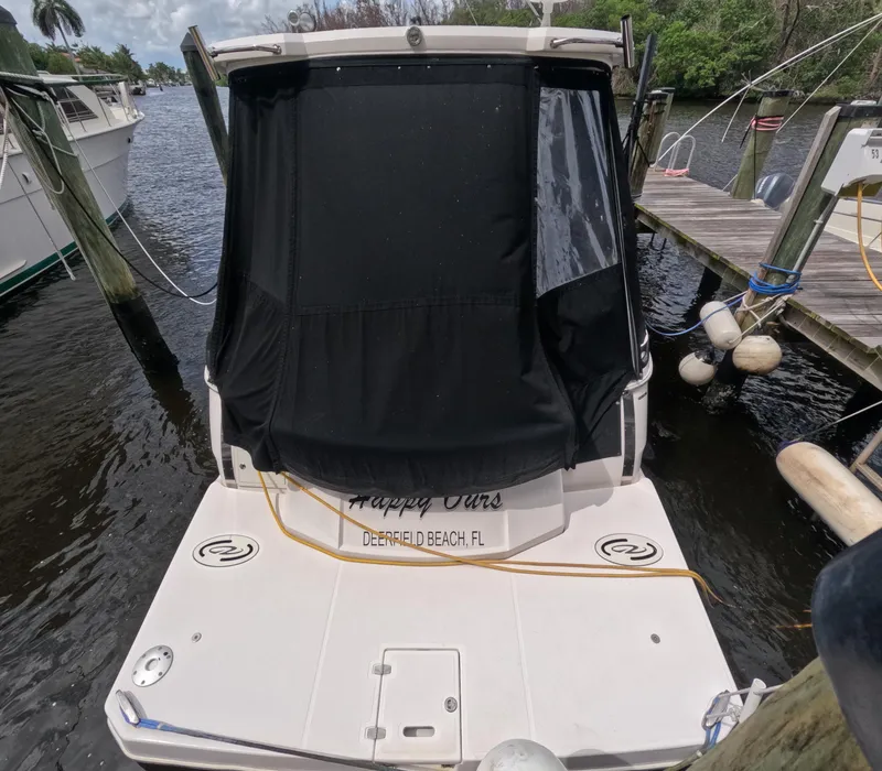 Slide: The Image of 2015 Regal 35 Sport Coupe docked at Deerfield Beach, FL marina. - 7