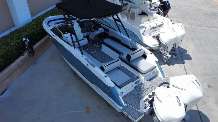 Slide: The Image of 2023 Cobalt R8 Outboard boat with Mercury engines, docked and ready for adventure. - 19