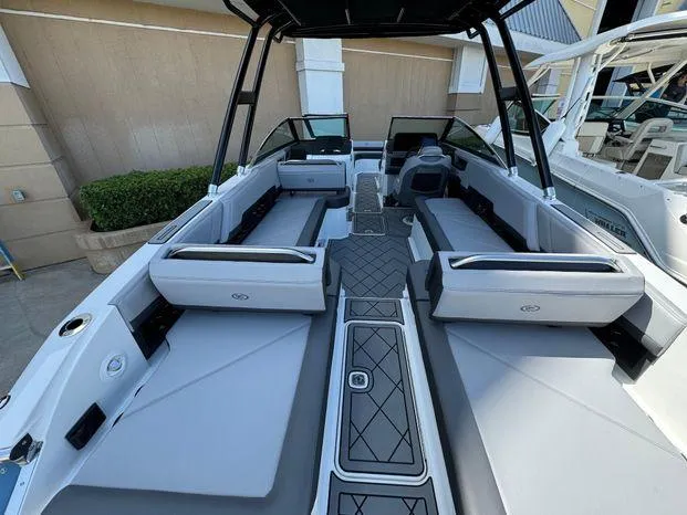 Slide: The Image of 2023 Cobalt R8 Outboard boat interior with spacious seating and modern design. - 21