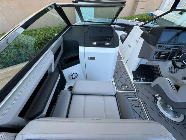 Slide: The Image of 2023 Cobalt R8 Outboard boat interior with modern seating and dashboard design. - 26