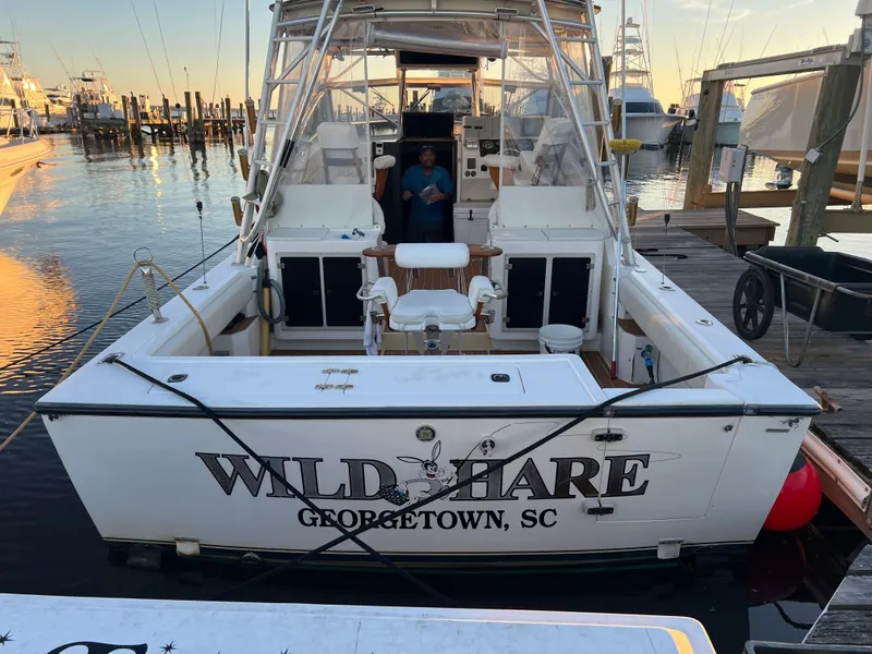 Slide: The Image of 1998 Albemarle 320 Express Fisherman boat docked, named "Wild Hare," Georgetown, SC. - 12
