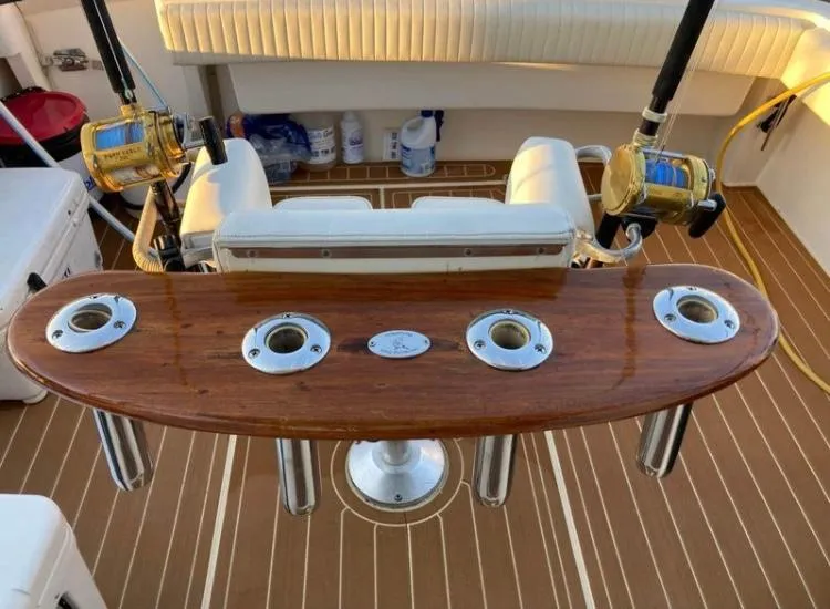 Slide: The Image of Fishing setup on 1998 Albemarle 320 Express Fisherman boat with rod holders and reels. - 14