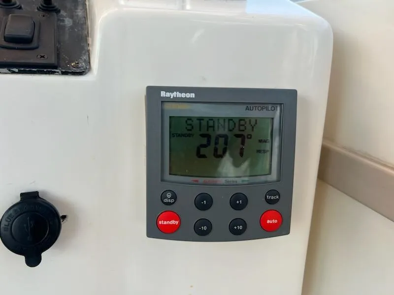 Slide: The Image of Raytheon autopilot display on 1998 Albemarle 320 Express Fisherman boat. - 37