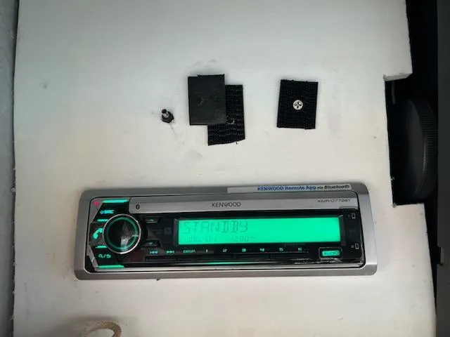 Slide: The Image of Kenwood stereo system in 1998 Albemarle 320 Express Fisherman boat. - 38