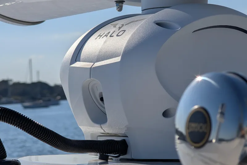 Slide: The Image of 2024 Boston Whaler 350 Realm radar equipment close-up on a sunny day. - 33