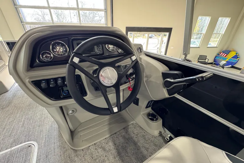 Slide: The Image of 2025 Berkshire 24RFC LE boat interior with modern seating and sleek design. - 12