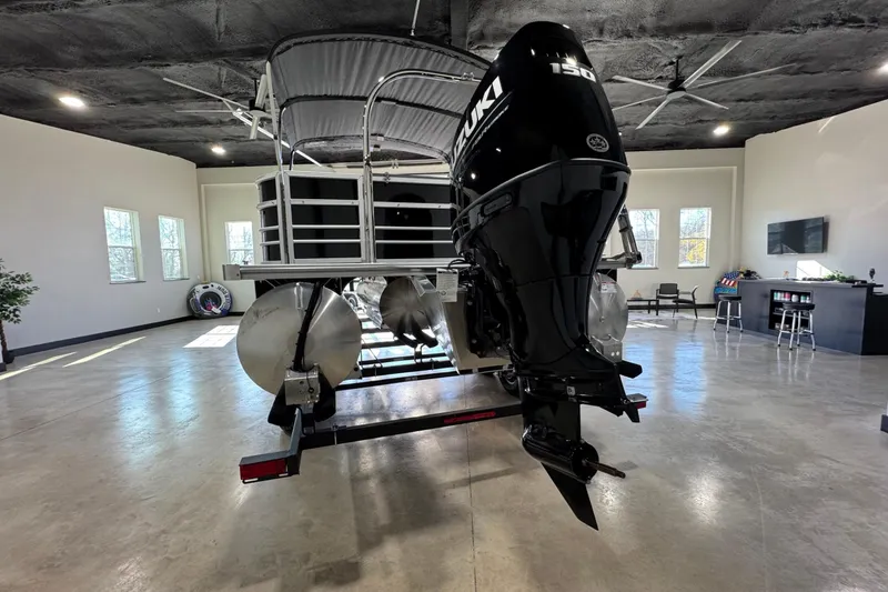 Slide: The Image of 2025 Berkshire 24RFC LE pontoon boat interior with modern seating and helm. - 8