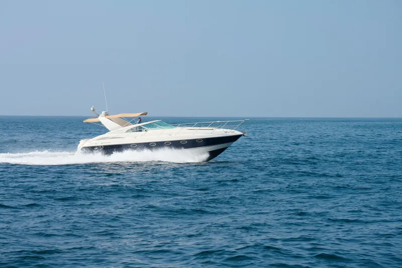 Slide: The Image of Luxury Fairline 43 yacht cruising on open sea, 2001 model. - 10