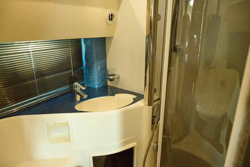 Slide: The Image of Luxurious bathroom interior of 2001 Fairline 43 yacht with modern fixtures. - 21