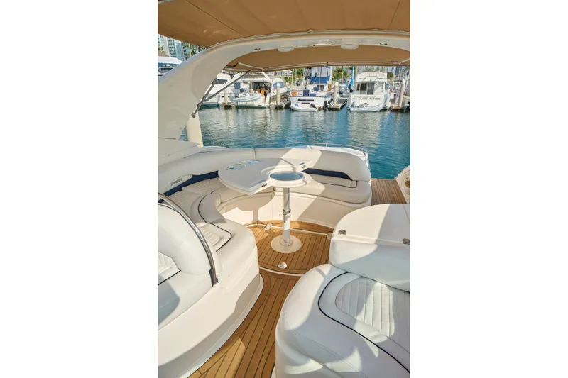 Slide: The Image of Luxurious 2001 Fairline 43 yacht interior with elegant seating and marina view. - 32