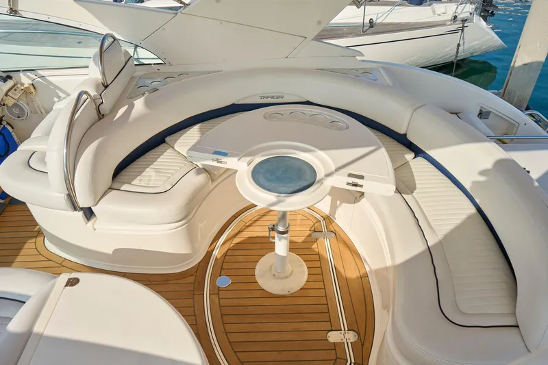 Slide: The Image of Luxurious seating area on a 2001 Fairline 43 yacht with elegant wood flooring. - 40