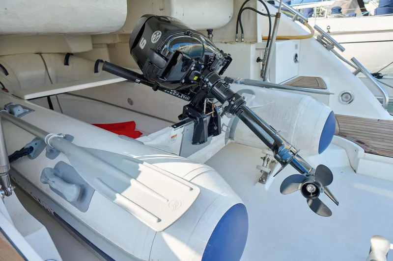 Slide: The Image of Inflatable boat with motor on Fairline 43 yacht, 2001 model, docked. - 51