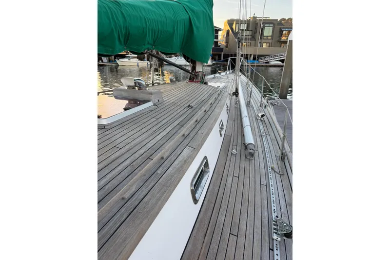 Slide: The Image of Custom 49' Schooner by Chuck Burns, 2007, docked with green sail cover. - 15