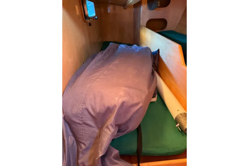 Slide: The Image of Interior cabin of 2007 Chuck Burns Custom 49' Schooner with covered equipment. - 29