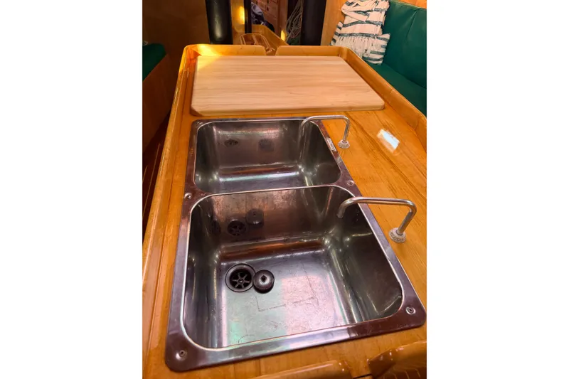 Slide: The Image of Dual stainless steel sinks on a 2007 Chuck Burns Custom 49' Schooner. - 36