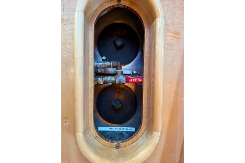 Slide: The Image of Close-up of a 2007 Chuck Burns Custom 49' Schooner component with wooden frame. - 48