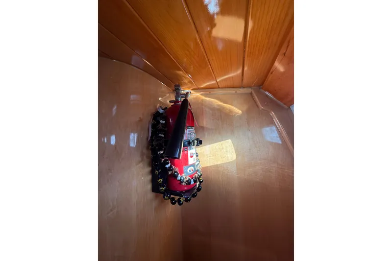 Slide: The Image of Fire extinguisher mounted on polished wooden interior of 2007 Chuck Burns Custom 49' Schooner. - 53