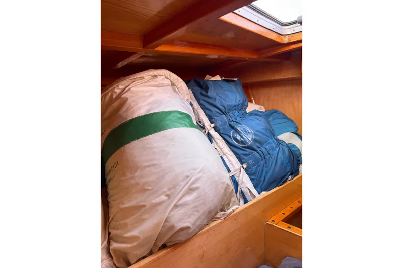 Slide: The Image of Storage area in a 2007 Chuck Burns Custom 49' Schooner with sails and gear. - 58