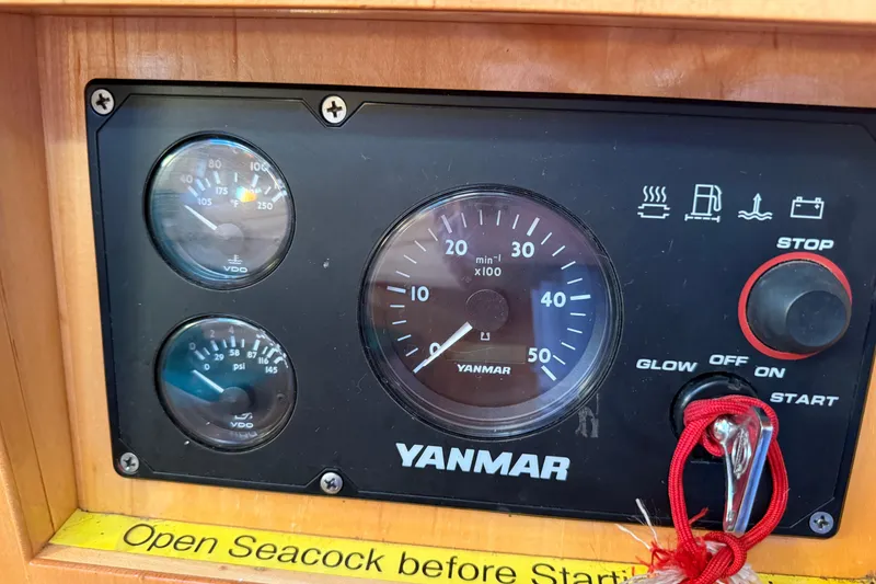 Slide: The Image of Control panel of a 2007 Chuck Burns Custom 49' Schooner with Yanmar gauges. - 63