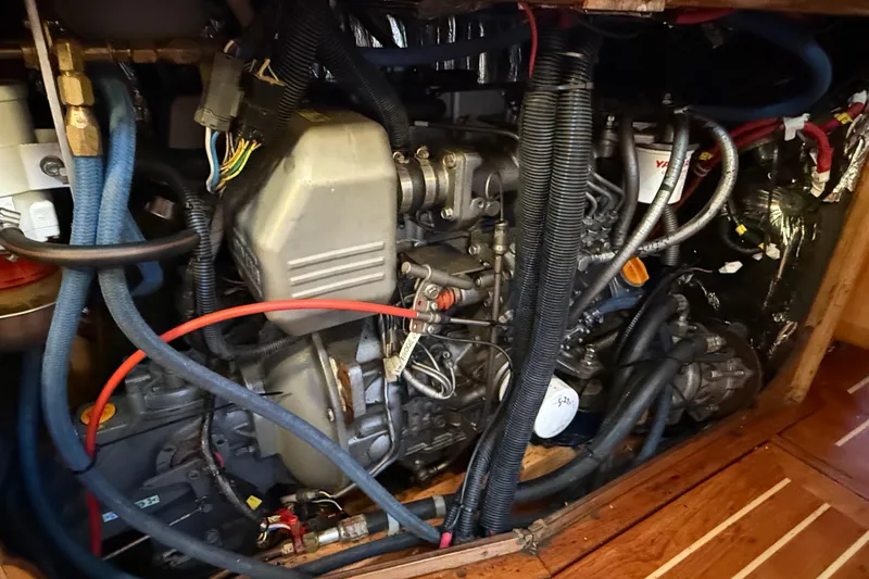 Slide: The Image of Engine compartment of a 2007 Chuck Burns Custom 49' Schooner, showcasing intricate wiring and components. - 65