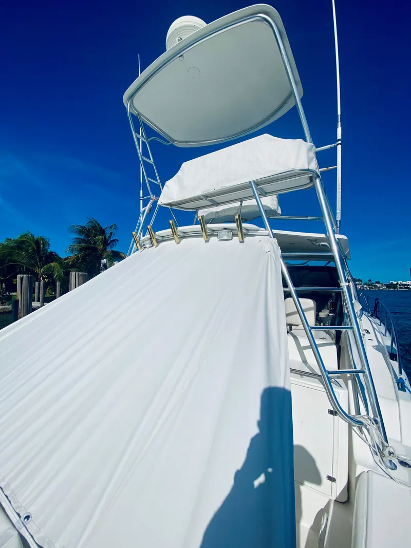 Slide: The Image of 1999 Tiara Yachts 43 Open with tower against clear blue sky. - 28