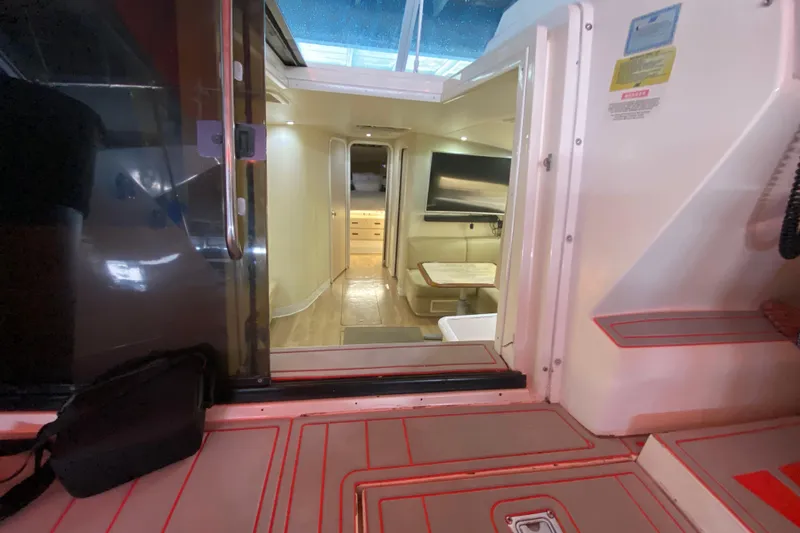 Slide: The Image of Interior view of 1993 Wellcraft 4300 Portofino yacht, showcasing modern cabin design. - 32