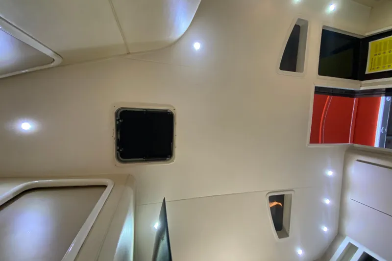 Slide: The Image of Interior ceiling of 1993 Wellcraft 4300 Portofino yacht with modern lighting. - 43