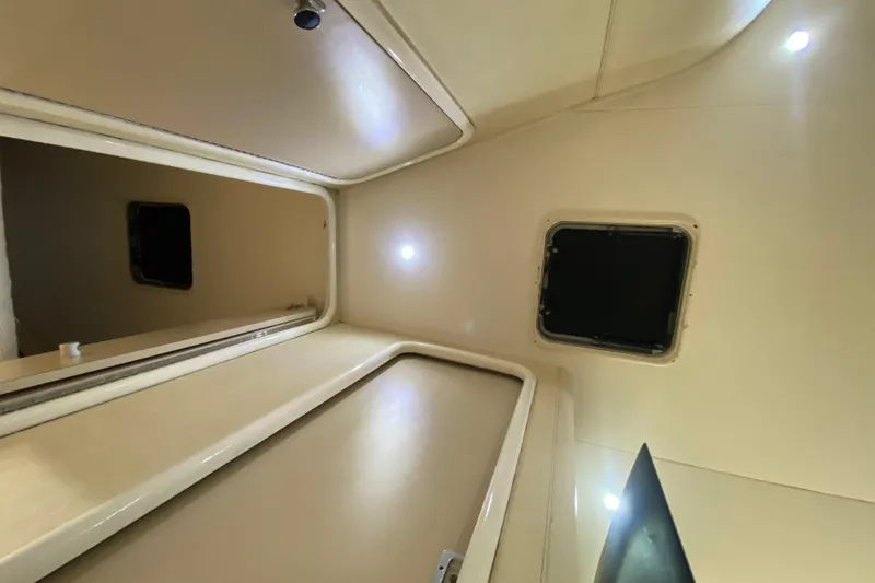 Slide: The Image of Interior view of 1993 Wellcraft 4300 Portofino yacht cabin ceiling with lighting. - 44