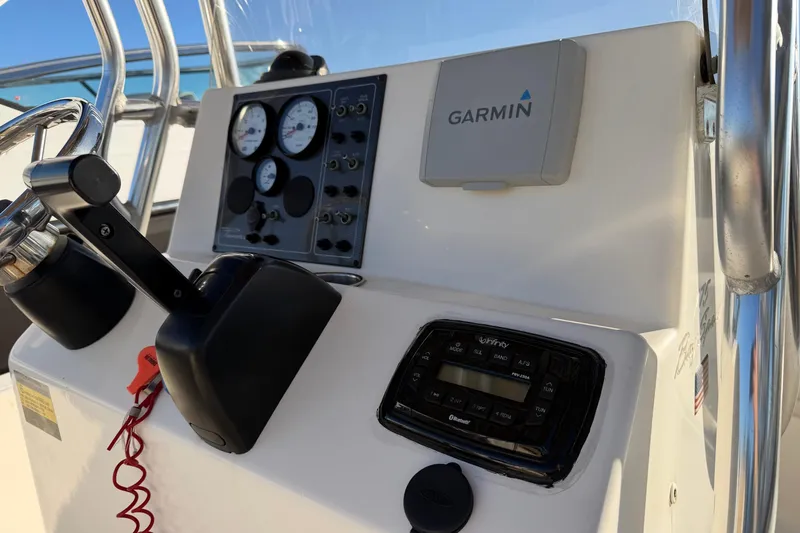 Slide: The Image of Control panel of 2016 Pioneer 175 Bay Sport boat with Garmin navigation system. - 12