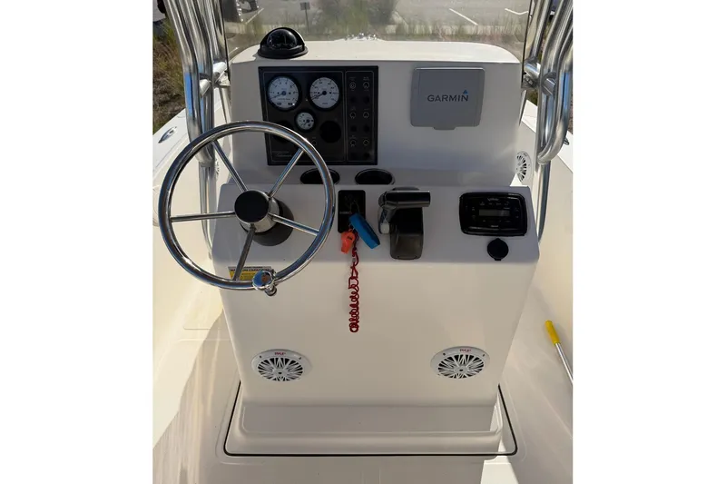 Slide: The Image of 2016 Pioneer 175 Bay Sport boat console with Garmin navigation system and steering wheel. - 13