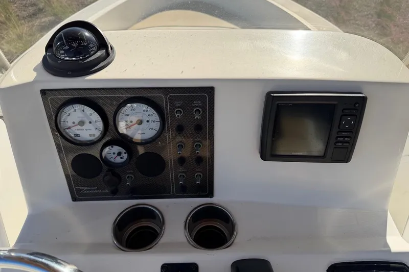Slide: The Image of Dashboard of 2016 Pioneer 175 Bay Sport boat with gauges and navigation system. - 14