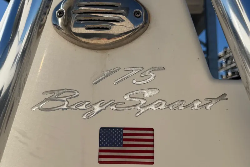 Slide: The Image of 2016 Pioneer 175 Bay Sport boat emblem with American flag detail. - 19