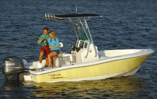 Slide: The Image of Trailer for 2016 Pioneer 175 Bay Sport boat on grassy lot. - 24