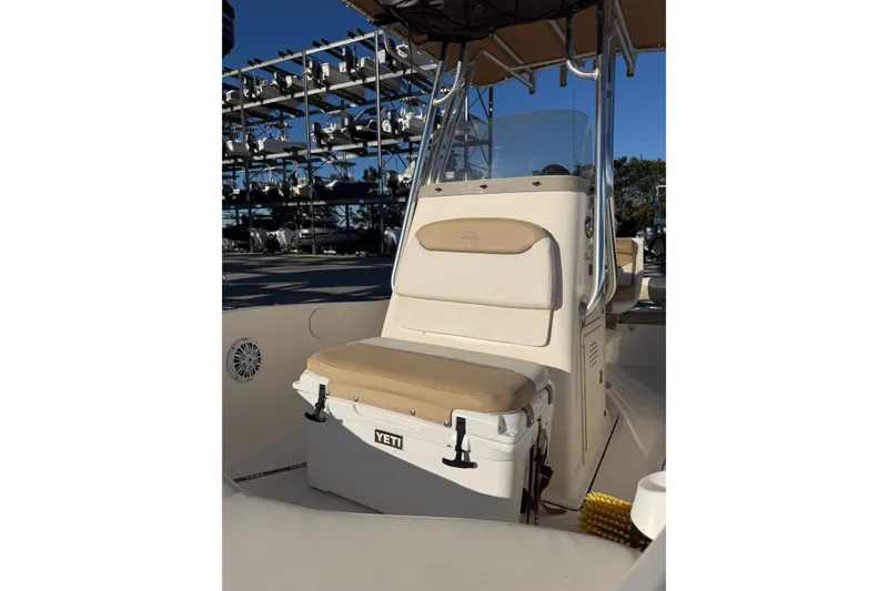 Slide: The Image of 2016 Pioneer 175 Bay Sport boat interior with Yeti cooler and seating. - 7