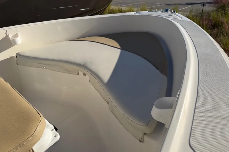 Slide: The Image of 2016 Pioneer 175 Bay Sport boat interior with cushioned seating. - 9