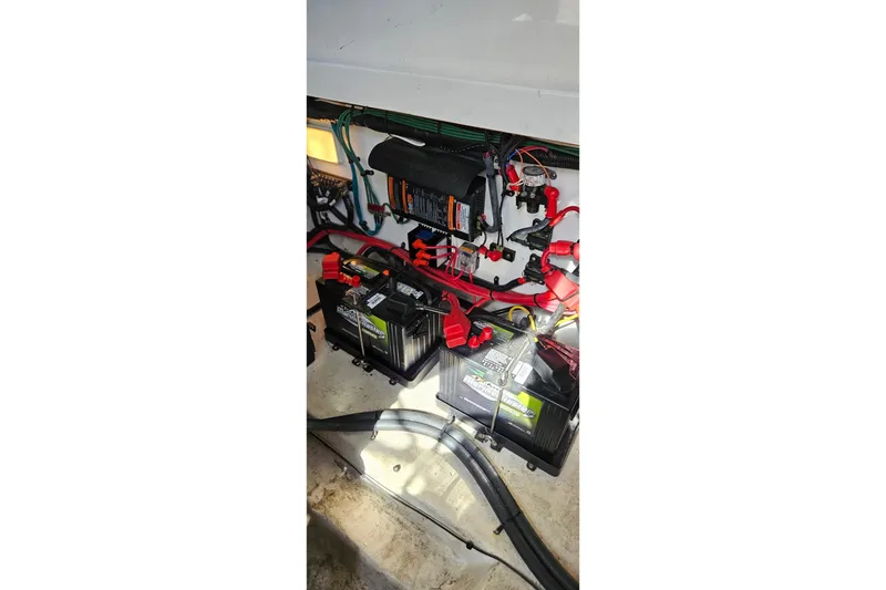 Slide: The Image of Electrical system of a 2009 Sea Ray 270 Sundancer boat, featuring batteries and wiring. - 15
