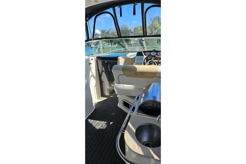 Slide: The Image of Interior view of 2009 Sea Ray 270 Sundancer boat cockpit and helm. - 3