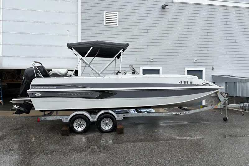Slide: The Image of 2022 Princecraft Ventura 224 boat on trailer, parked outside a building. - 5