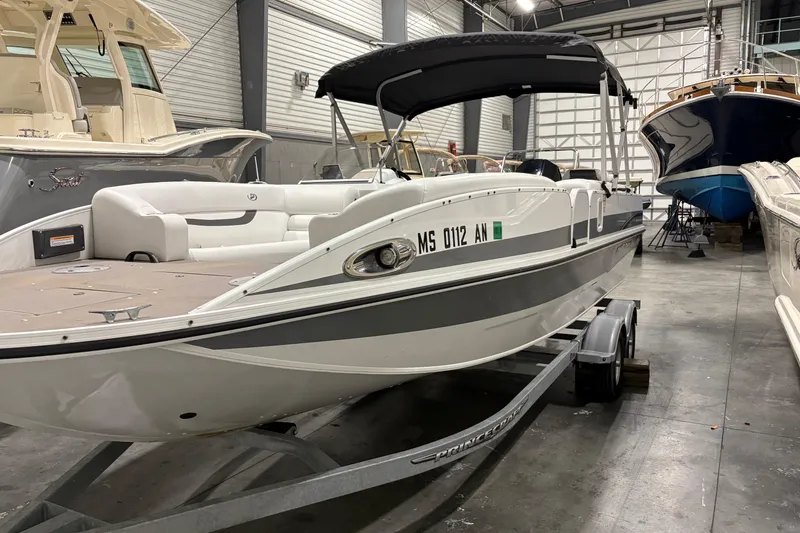 Slide: The Image of 2022 Princecraft Ventura 224 boat in indoor storage on a trailer. - 8