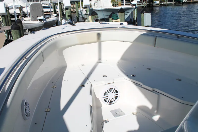 Slide: The Image of 2016 Robalo R300 Center Console boat interior at marina dock. - 11