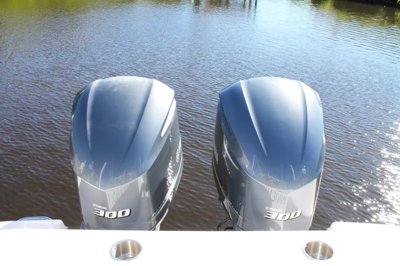 Slide: The Image of Twin Yamaha 300 engines on a 2016 Robalo R300 Center Console boat. - 40