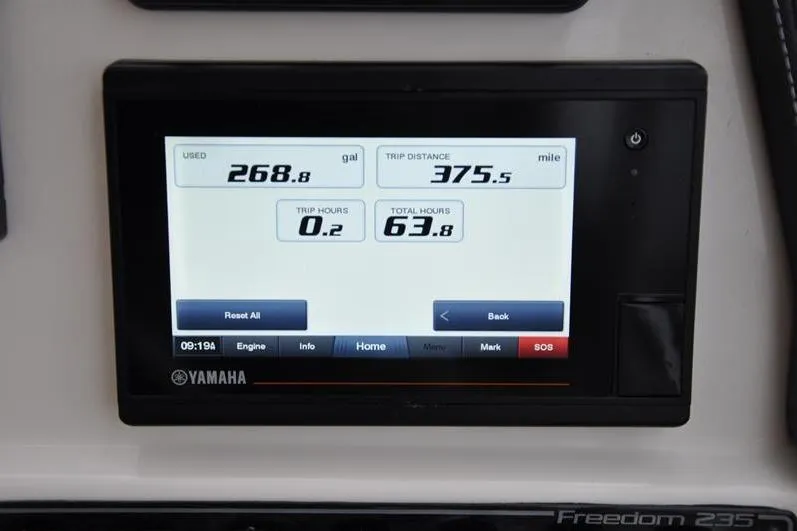 Slide: The Image of Yamaha display on 2022 Grady-White Freedom 235 showing fuel and trip data. - 25